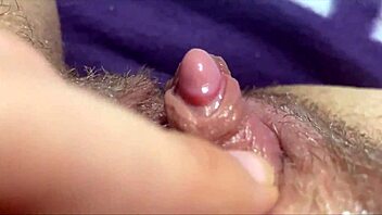 huge clit throbs as she jerks to explosive squirting orgasm!