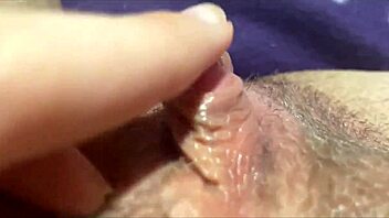 huge clit throbs as she jerks to explosive squirting orgasm!