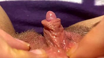 huge clit throbs as she jerks to explosive squirting orgasm!