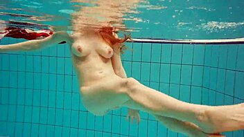 hot polish teen marketa teases bikini pussy underwater at the pool?