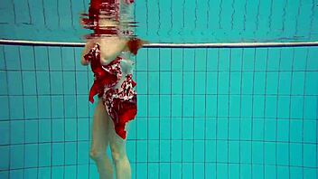 hot polish teen marketa teases bikini pussy underwater at the pool?