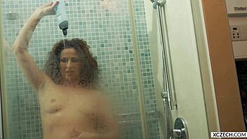 Reina Pornero's Sexy Shower Exposes Huge Tits Mature Curves