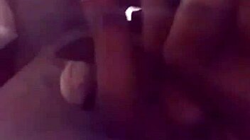 masked lover spreads wide with bar spreader from her fetish shop
