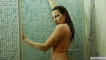 Reina Pornero's Sexy Shower Exposes Huge Tits Mature Curves