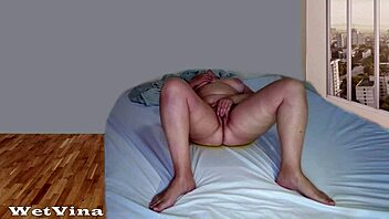 shaking real orgasm hits as wife pees wet in bed squirting