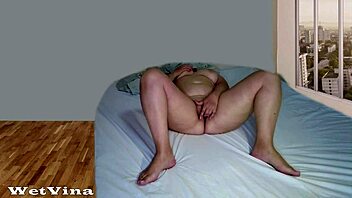 shaking real orgasm hits as wife pees wet in bed squirting