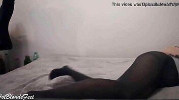 Her irresistible nylon legs in leggings drive me wild!