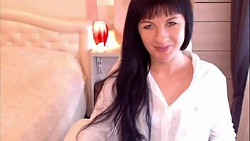 Helga Muah strips teasing in lingerie with small perky tits.