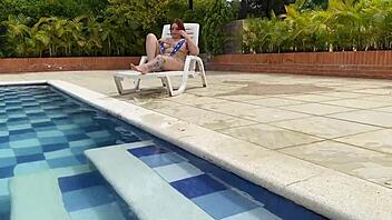 naughty redhead andy rose tastes big cock pool ride