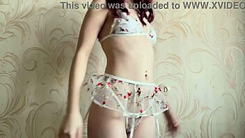 skinny redhead amateur teases in skimpy white lingerie
