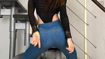 bold chinese babe dances seductively in skin-tight jeans