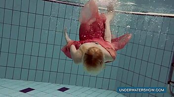 i slip into red dress feeling pool water tease my curves