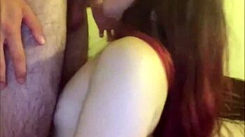 that amateur shemale teen kneels to slurp her lover's throbbing cock hungrily