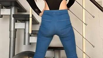 bold chinese babe dances seductively in skin-tight jeans