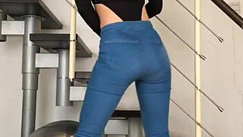 bold chinese babe dances seductively in skin-tight jeans