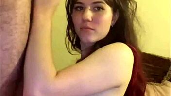 that amateur shemale teen kneels to slurp her lover's throbbing cock hungrily
