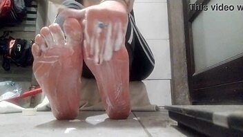 sexy amateur shows off feet and slicks them up