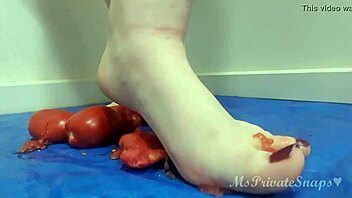 crushing tomatoes gets my bare feet so messy wet