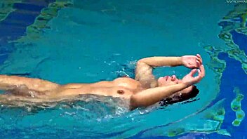 hungarian babe sazan swims naked teasing poolside