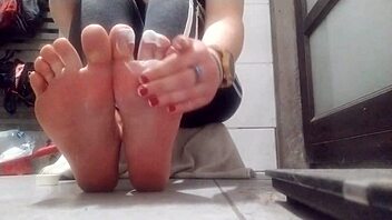 sexy amateur shows off feet and slicks them up