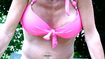 Annabelle Dangel shoves bottle deep in garden for wild insertion play