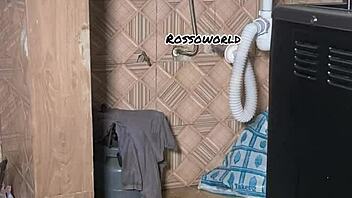 hidden cam captures naked milf in secret room