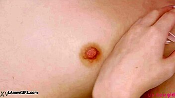 redhead model poses nude showing off her sexy petite body