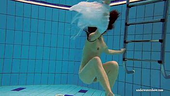 kristy the hot russian babe with big boobs dives in pool