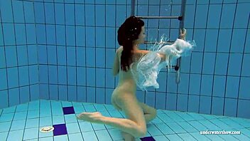 kristy the hot russian babe with big boobs dives in pool