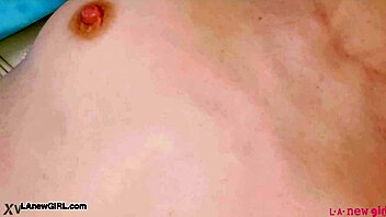 redhead model poses nude showing off her sexy petite body