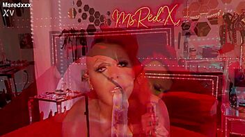 Ms Red deepthroats giant dildo ride