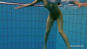 kristy the hot russian babe with big boobs dives in pool