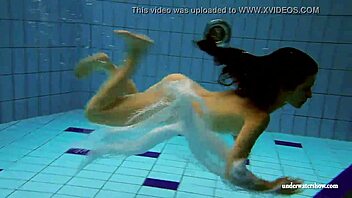 kristy the hot russian babe with big boobs dives in pool