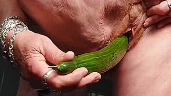 oma shove cucumber deep in hairy granny pussy now