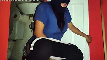 WHORE BALACLAVA FLASHES MATURE VAGINA IN WORK WAREHOUSE PORN