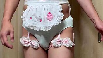 Cute Japanese maid plugs ass in public toilet