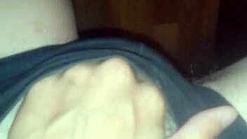 skinny brunette caresses wet pussy in shorts to squirting orgasm