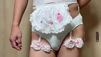 Cute Japanese maid plugs ass in public toilet