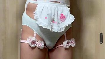 Cute Japanese maid plugs ass in public toilet