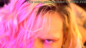 busty blonde pornstar gives sloppy backstage blowjob and foot handjob