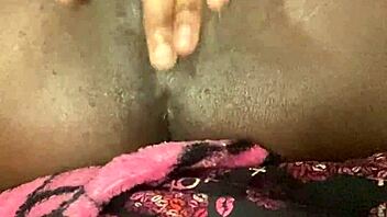 Ebony babe fingers wet pussy to dripping orgasm solo