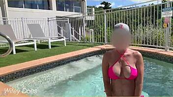 wife flashes her big tits poolside at hotel hey 😏