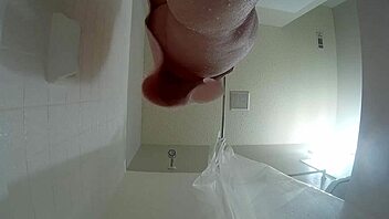 Chubby Brunette Pees Then Showers Saggy Tits and Hairy Pussy!