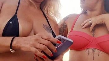 Chatting dirty on beach then popping cherry with naughty friend