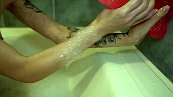 sexy tattooed teen rubs huge dildo wet pussy