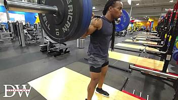 Athletic bodybuilder does fullbody workout routine