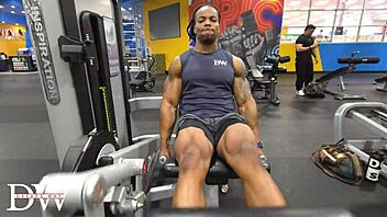 Athletic bodybuilder does fullbody workout routine