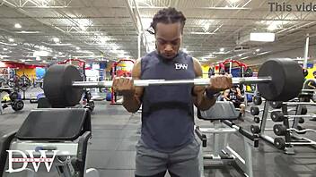 Athletic bodybuilder does fullbody workout routine