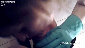 Milf wears plastic gloves for milking session