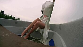the girl was riding on the lake in a boat and took off her clothes hidden camera sj